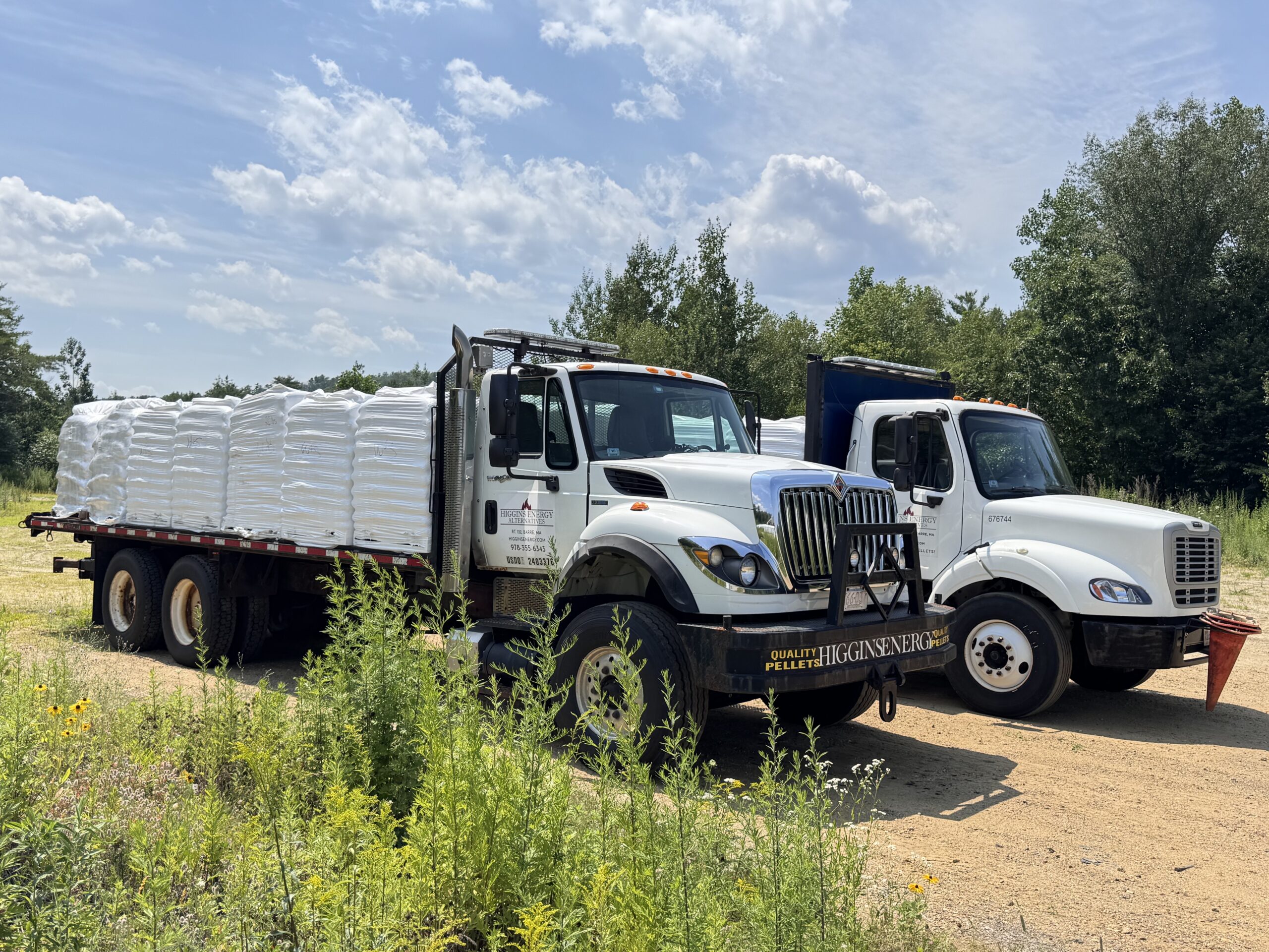 Higgins Energy Pellet Delivery Trucks Parked Outside