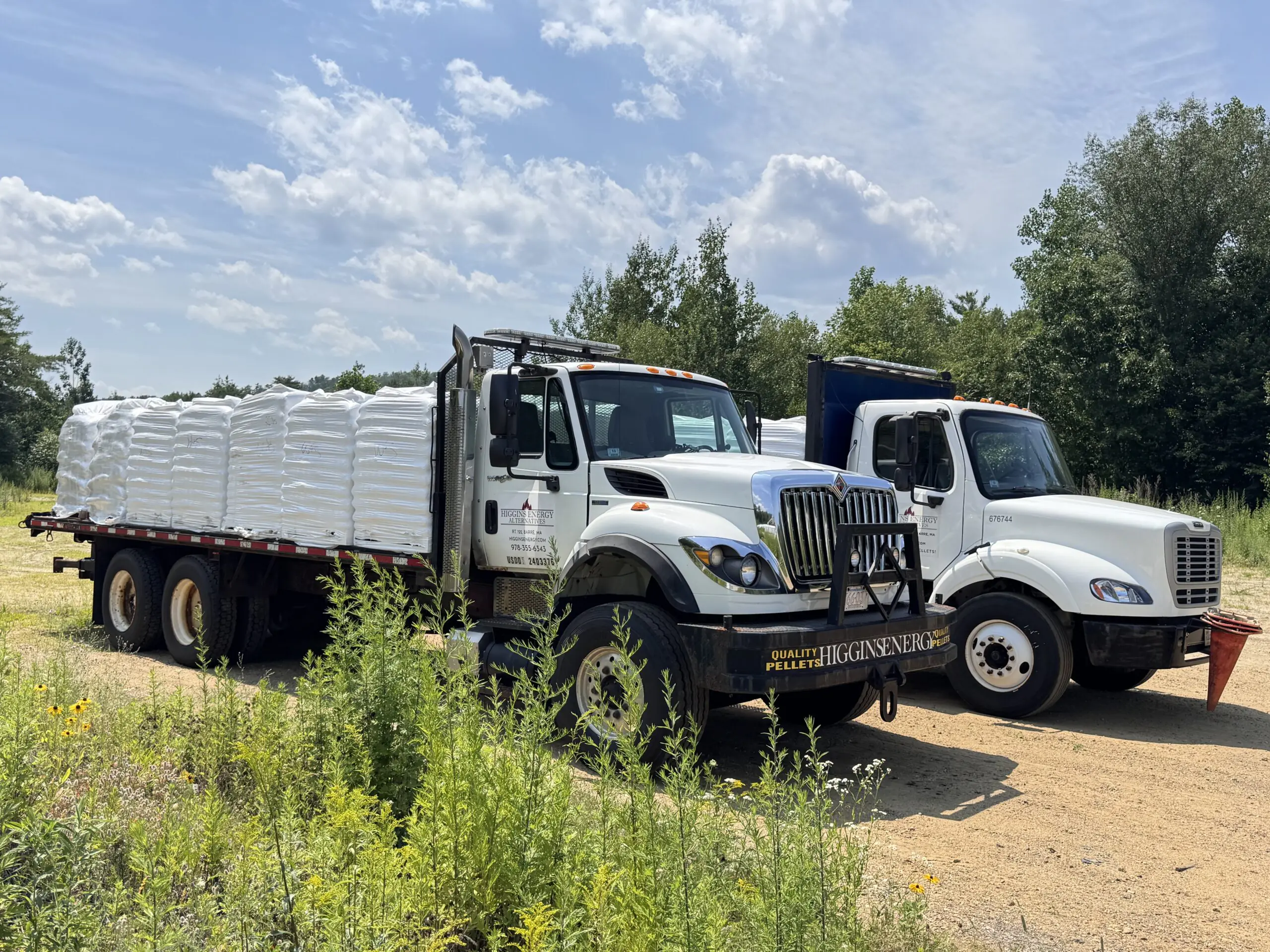 Higgins Energy Pellet Delivery Trucks Parked Outside