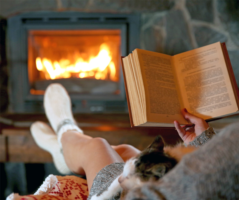 Reading by the Fireplace